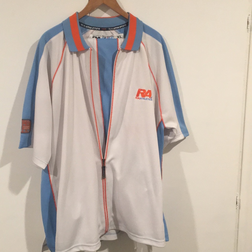 Running suit-never  worn-long pants 32/34 length